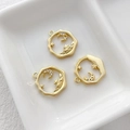 Detailed view of 14k gold-plated celestial pendant with white zircons on ceramic tray - 18k Gold Plated Moon Star Style