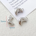 Detailed view of three 15x10mm silver moon pendants with zircon for jewelry making - Moon Rhinestone Style