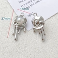 Macro view of silver melting rose pendants with pearl inlay for jewelry making - Rose Flower Pearl Style