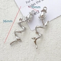 Detailed view of silver rose pendants with thorny stems for jewelry making, size 36x10mm - Rose Branch Style