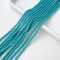 Gros plan de perles rondes en pierre naturelle cyan pour création de bijoux DIY - 2mm / Style 19 Bleu Cyan (2MM)