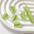 Macro shot of glass beads with green waves and pink dots on a ceramic plate - Green Pink Yellow Polka Dot Wave Style (5#)