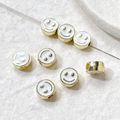 Macro view of colorful enamel smiley face beads for DIY jewelry making and handmade crafts - K Gold