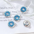 Detail of five blue enamel donut charms with silver finish for DIY jewelry making - Silver Blue Donut (7# Silver Single Price)