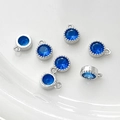 Vista macro de seis colgantes de circón azul con bordes milgrain para joyería artesanal - 8# Tono Plateado Zirconia Azul Real