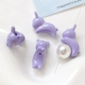 Dettaglio di perline di coniglio viola e perla AB su vassoio per gioielli fai-da-te - Perlina a Coniglio Sciolta / Viola