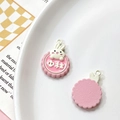 Detailed view of pink resin bunny pendants with Mid-Autumn festival motifs in a ceramic dish - Universal Specification / Pink White Rabbit Head Mid-Autumn (23#)