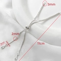 Detail of adjustable 14k gold box chain with cubic zirconia teardrop charm and slider bead - Silver Long Style With Zircon