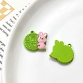 Macro detail of cartoon bunny mooncake alloy pendants showing front and back textures - Universal Specification / Pink Green Rabbit Mooncake (32#)