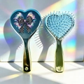 Detail of teal metallic heart hairbrush with bow pattern and elastic air cushion - Black and White Polka Dot Bow Style (B)