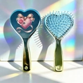 Dettaglio di spazzole massaggianti a cuore con motivi floreali e setole blu morbide - Stile Fiocco Cuore di Paillettes (B)