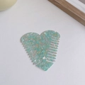 Heart-shaped hair comb in blue and green marble acetate finish with anti-static design - Cyan