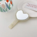 Elegant heart-shaped acetate hand mirror with a creamy yellow marbled finish and long handle - 7cm / Dazzling White