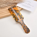 Handheld acetate hair comb with tortoise shell pattern and dual-density teeth for styling - Dark Leopard Print