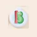Foldable air cushion hairbrush with mirror featuring a cute green dinosaur cartoon - Dinosaur Style I