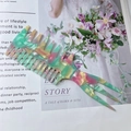 Pink and green marble acetate wide-tooth hair comb with three-prong fishbone design - Pink and Green