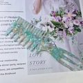 Blue marble acetate hair comb with wide trident teeth for hairstyling and detangling - Cyan