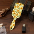 Air cushion hairbrush featuring vibrant sunflower patterns on a cream background - Classic Sunflowers