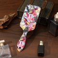 Floral paddle hairbrush with tropical bird print on a vintage dark wood background - Standard Type / New Style