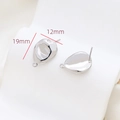 Detailed macro view of 19mm silver irregular oval earring charms for DIY jewelry making - Silver Smooth Irregular Drop Style (8#)