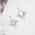 Detail of silver alloy star charms with zircon inlay for DIY jewelry making - Polished Eight-Point Star (9# Silver Tone)