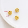 Detalle de tres cuentas de filigrana doradas de 10 mm para creación de joyas DIY - Cuenta de la Suerte de Filigrana Hueca (7#)