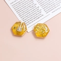 Detail of hexagonal resin guitar charm with gold foil and yellow glitter for DIY jewelry - Yellow