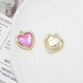 Detailed view of alloy heart charms with pink resin inlay and gold textured finish for DIY - Red-Pink Iridescent Heart (19# Gold Tone)