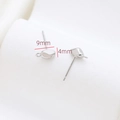 Macro detail of 9x4mm silver-plated earring studs with small loops for jewelry making - Silver Tiny Irregular Bean Style (33#)