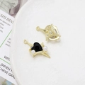Detailed view of gold alloy charms featuring heart black gemstone and white pearls - Star Charm with Black Gem (24# Gold Tone)