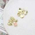 Detailed view of bowknot and heart charms with pink enamel for DIY jewelry making - Pink Enamel Heart Bow (29# Gold Tone)