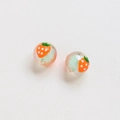 Macro detail of handmade strawberry glass beads for DIY jewelry with green core and red patterns - Emerald Green Strawberry Hand-painted Style (9#)