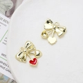 Macro view of gold bow and red enamel heart pendant for DIY jewelry making - Red Enamel Heart Bow (31# Gold Tone)
