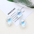 Close-up of three iridescent aurora glass sphere charms with rings for DIY jewelry making - Aurora Iridescent (3#)
