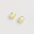 Close-up of sphere charms with yellow base and colorful stars for DIY jewelry - Yellow Base Pentagram Dreamy Style (19#)
