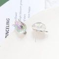 Macro shot of iridescent tulip flower stud earrings with a shiny pearlescent finish - Silver Tulip (Pair Of Stud Earrings)
