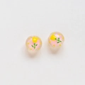 Macro shot of pink translucent beads with hand-painted yellow tulips and green leaves - Pink Base Yellow Tulip Style (26#)