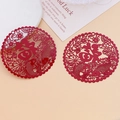 Close-up of traditional Chinese Fu character pendants with lotus and koi fish patterns - Fu Character Koi Round Plate