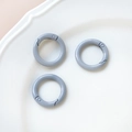 Three matte grey O-ring spring clasps displayed on a white tray for DIY crafts - 3# Small Round Ring (Single)