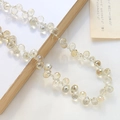 Makroaufnahme facettierter Champagner-Glastropfenperlen für DIY-Schmuck - 1 Strang (ca. 100 Perlen) / Champagner (3#)