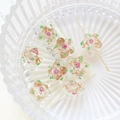Macro detail of plum blossom glass beads with gold glitter and pink rose center for DIY jewelry - Clear With Glitter (1#)