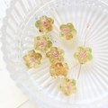 Macro shot of amber glass flower beads with pink rose details in a ribbed glass bowl - Light Yellow Style (4#)