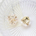 Macro detail of floral charms with pearls and rhinestones on gold metal base - Style 1 (1#)