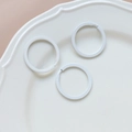 Close-up of three white matte metal key rings for DIY accessories on a white plate - 42# Large Round Ring (Single)