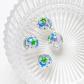 Detailed view of iridescent star and moon beads in a glass bowl for DIY jewelry making - Price per Piece / Iridescent Star Moon Style (5#)