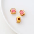 Macro shot of gold rabbit enamel square beads with pink and white details for DIY jewelry - Pink Square Rabbit (1#)