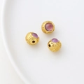 Macro shot of 18k gold-plated lucky rabbit beads with purple stone and Fu character - Purple Gem Fu Character Bead (4#)