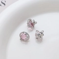 Macro shot of dolphin alloy pendant with pink translucent resin orb for DIY jewelry - Silver Dolphin With Pink Sphere