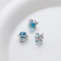 Detailed view of dolphin-themed blue crystal charms with planetary rings for DIY jewelry - Silver Dolphin With Blue Sphere