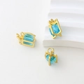 Three-piece set of gold-plated gift box charms with blue cubic zirconia and bow detail - Blue